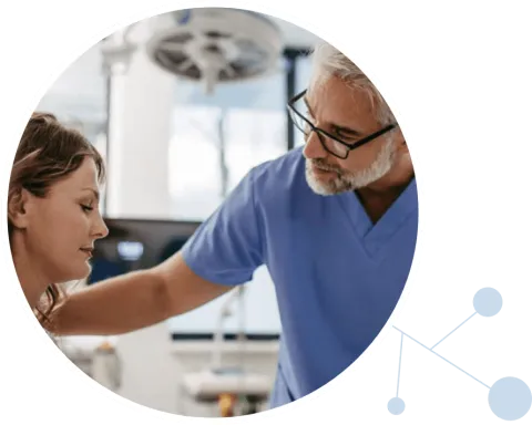 Doctor reassuring female patient